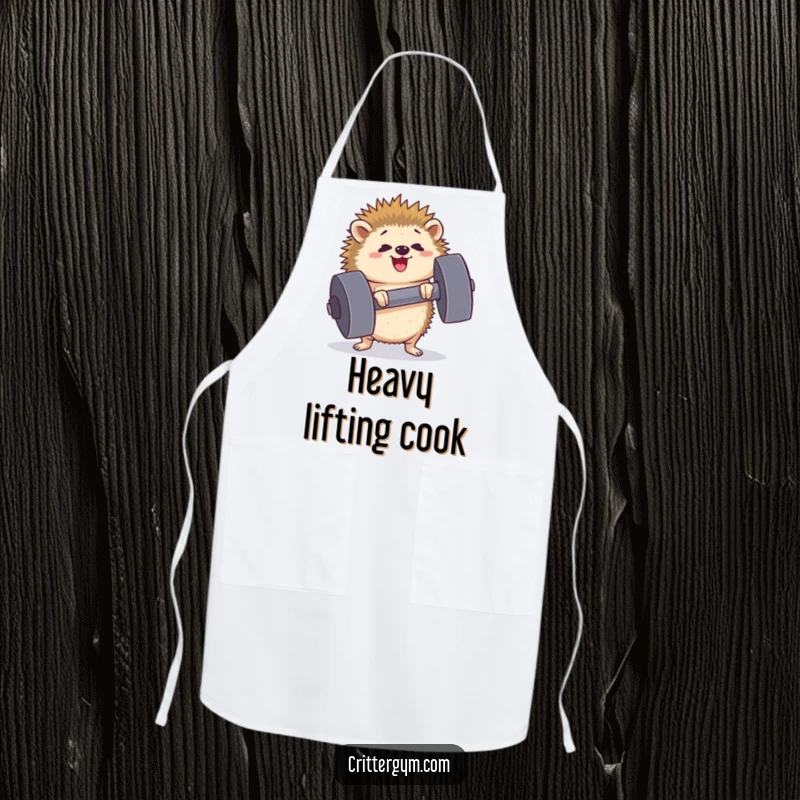Funny determined hedgehog apron lifting a comically large dumbbell while cooking, perfect for adding a motivational touch, great for a gift.