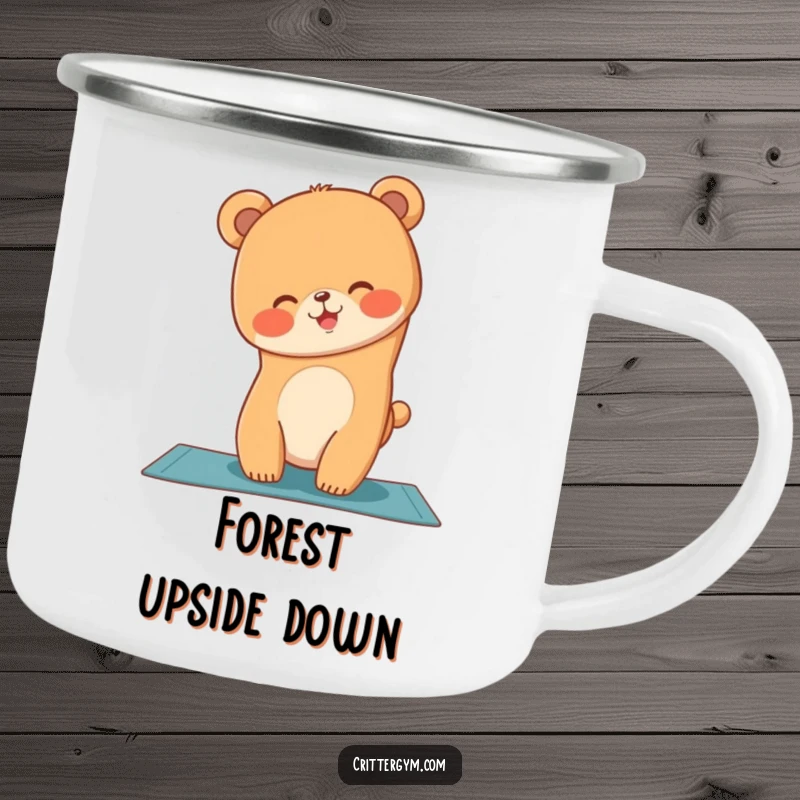 Funny camping mug with a giggling bear cub doing a yoga handstand on a mat, ideal for outdoor enthusiasts.