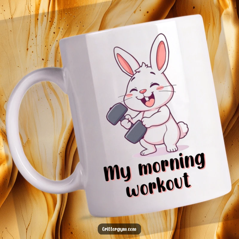 Funny rabbit gym mug with a smiling rabbit character comically failing to lift a tiny dumbbell, showcasing relatable workout humor.
