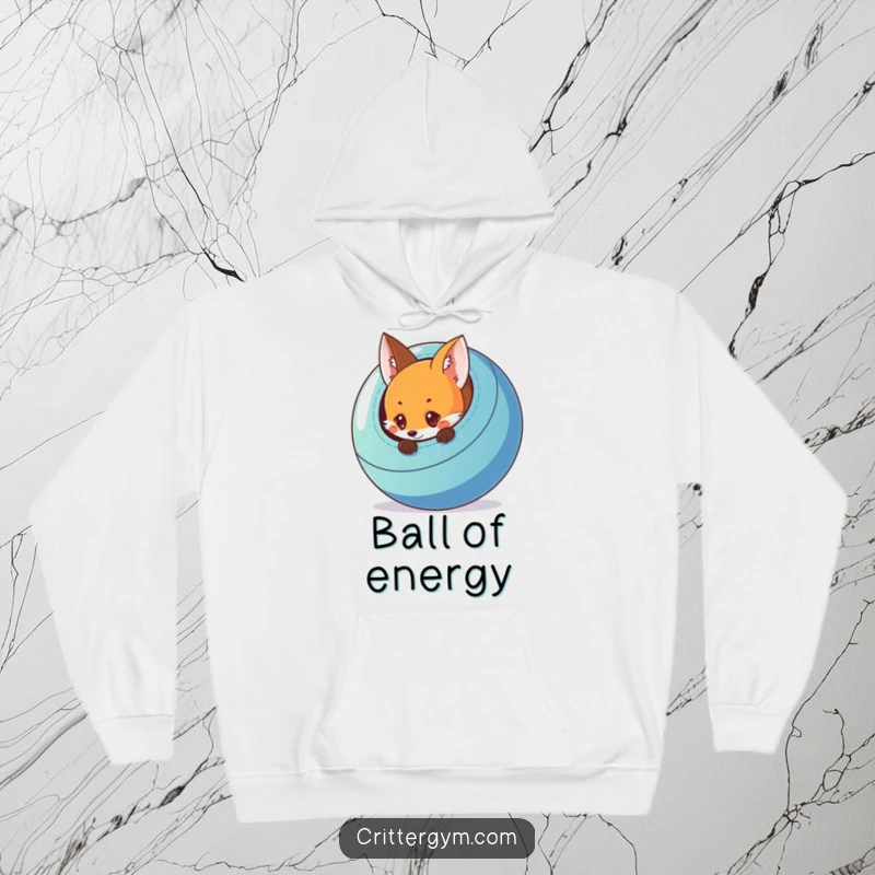 Funny and warm hoodie featuring a curious fox peeking from behind a colorful exercise ball, soft and humorous.
