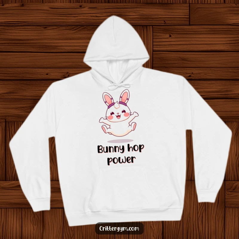 Funny cheerful bunny wearing sweatbands, doing a cartwheel with joy, featured on a comfortable hoodie, a fantastic funny gift.