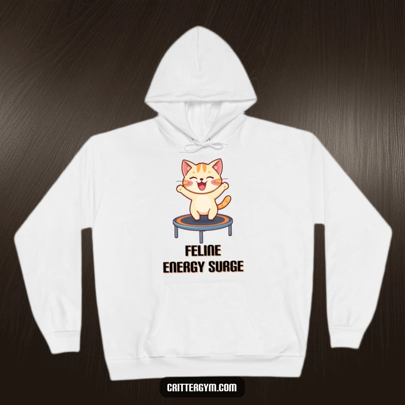 Funny hoodie showcasing a cheerful cat excitedly bouncing on a miniature trampoline, perfect for cozy, playful days.