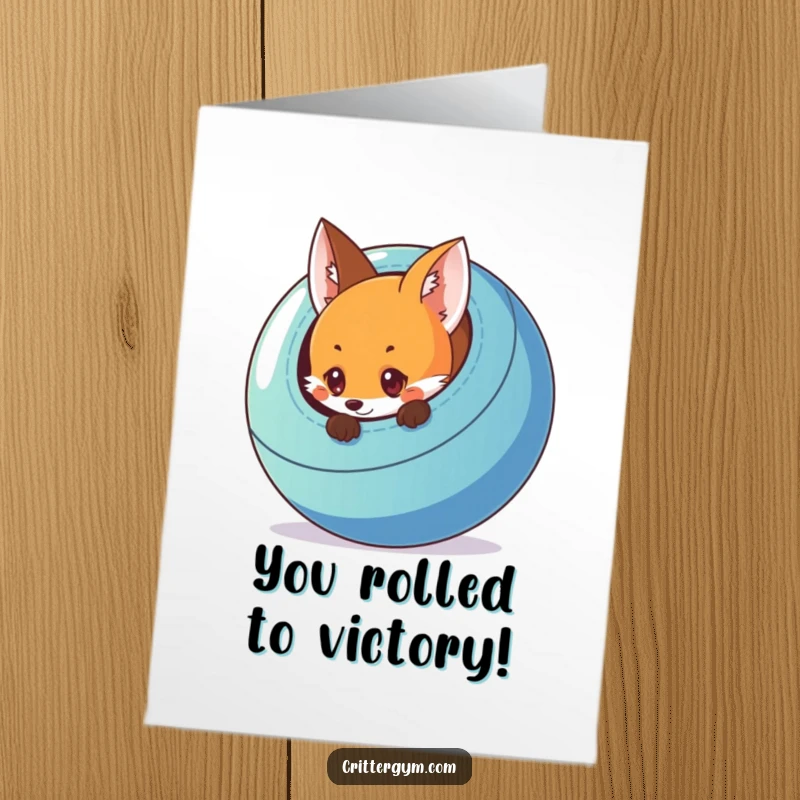 Funny Free Printable Congratulations Card: A curious fox peeks from behind a large exercise ball, celebrating success.