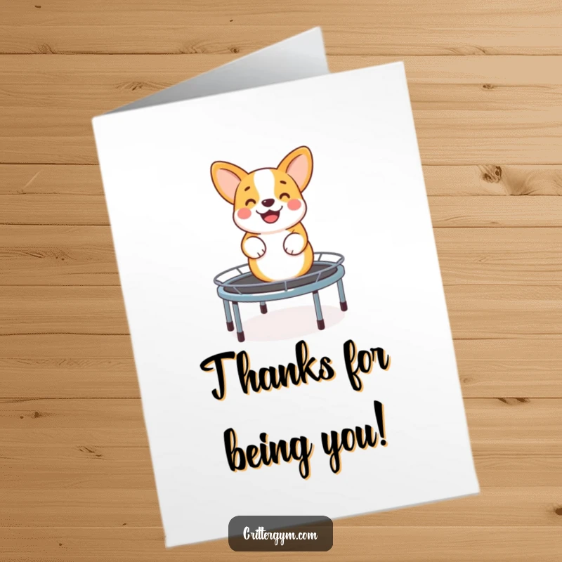 Funny Free Printable Thank You Card: A smiling corgi happily bouncing on a miniature trampoline, conveying sincere thanks.