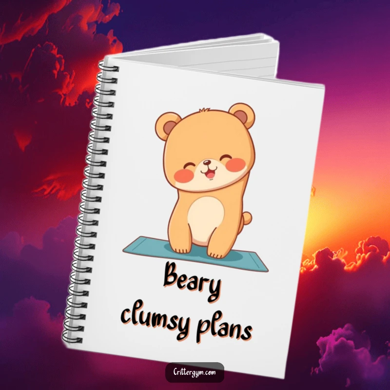 Funny notebook cover featuring a giggling bear cub attempting a yoga handstand on a mat, ready for notes.