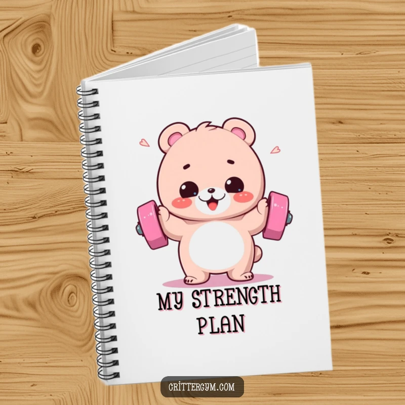 Funny notebook showcasing a fluffy bear gleefully lifting a barbell with sweat flying, perfect for logging workout progress.