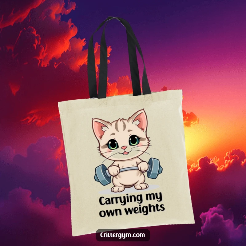 Funny tote bag with a proud kitten posing after lifting weights, perfect for carrying gym gear with a humorous twist.
