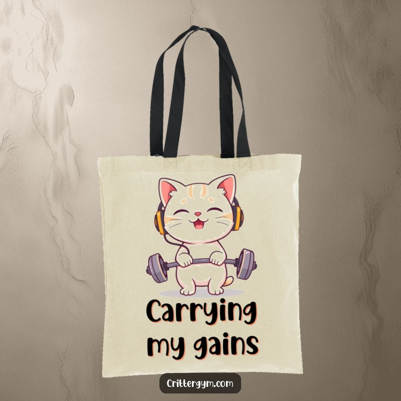 Funny cat tote bag with a giggling character wearing tiny headphones, happily lifting a miniature barbell.
