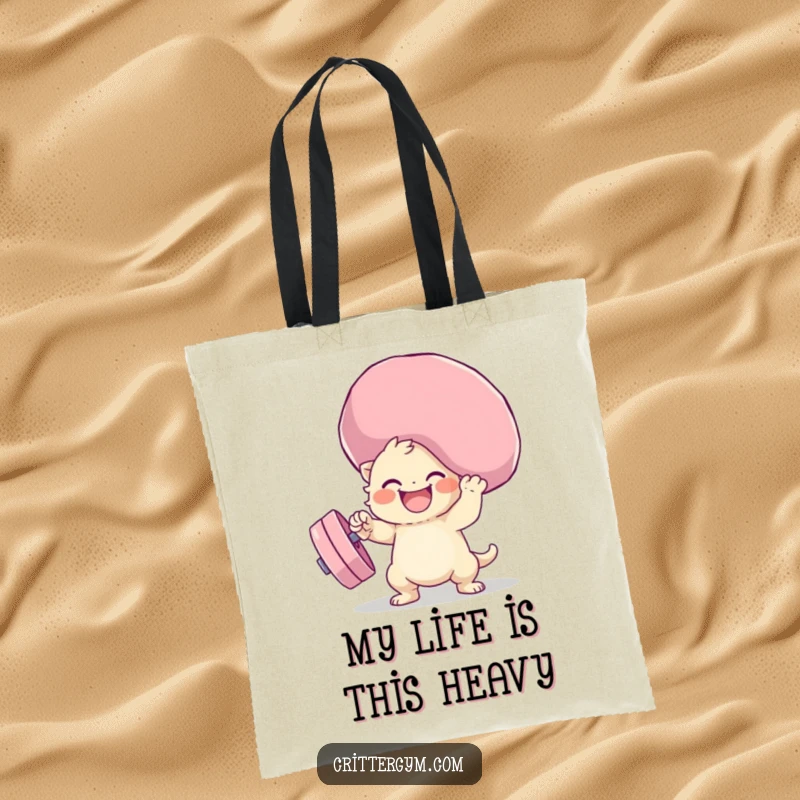 Funny squishy weight lifting tote bag depicting a cute creature struggling playfully with a huge, soft dumbbell, great for daily use.